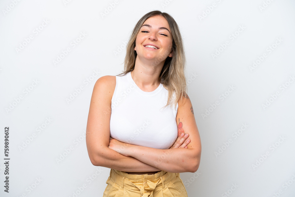 Young Rumanian woman isolated on white background keeping the arms crossed in frontal position Young Rumanian woman isolated on white background keeping the arms crossed in frontal position