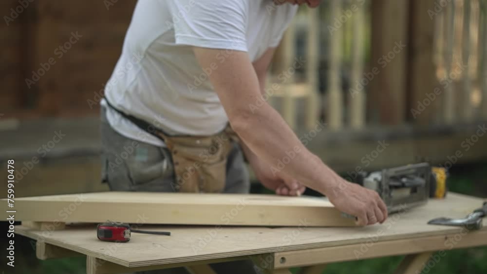 wood processing. a worker takes measurements. a man uses a ruler. High quality video in FullHD format. wood processing. a worker takes measurements. a man uses a ruler. High quality video in FullHD format.
