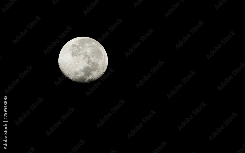 Full moon in black of night with craters Full moon in black of night with craters