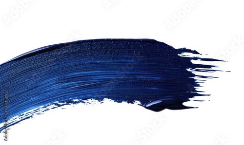 Thin round brush stroke in deep blue on white background