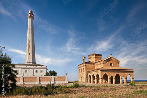 Punta Penna, Vasto, Abruzzo, Italy: view of the tall lighthouse and the Catholic church Santa Maria di Pennaluce on the coast of the Adriatic Sea