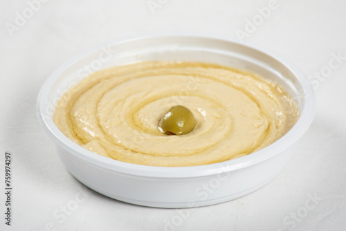 bowl of hummus isolated on white background, all side view focused Appetizer 