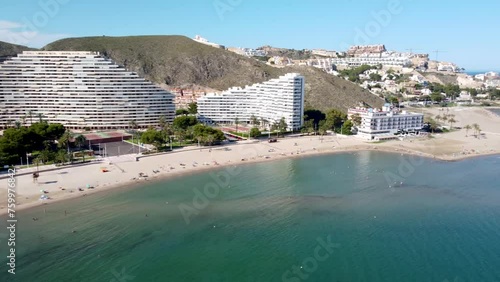 Drone view of the Raco beach of the tourist town of Cullera in the province of Valencia (Spain) with holiday apartment buildings photo