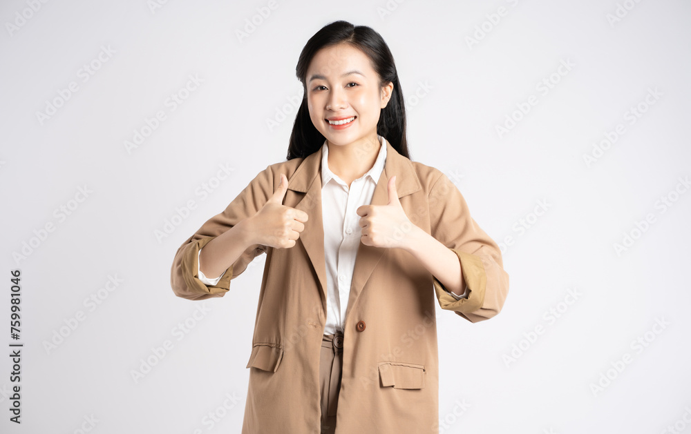 Portrait of young Asian businesswoman posing on white background Portrait of young Asian businesswoman posing on white background