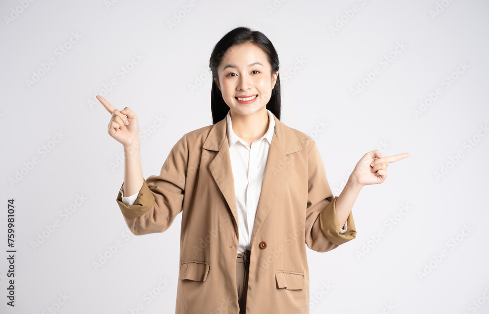 Portrait of young Asian businesswoman posing on white background Portrait of young Asian businesswoman posing on white background