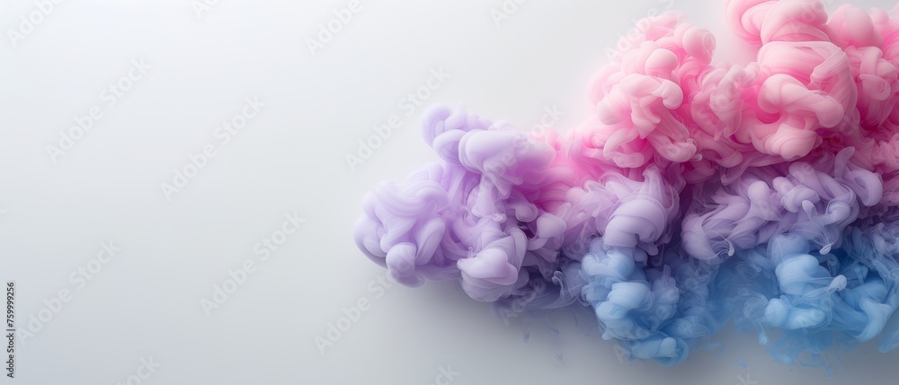  a group of multicolored clouds of smoke on a white background in the shape of a wave of smoke.