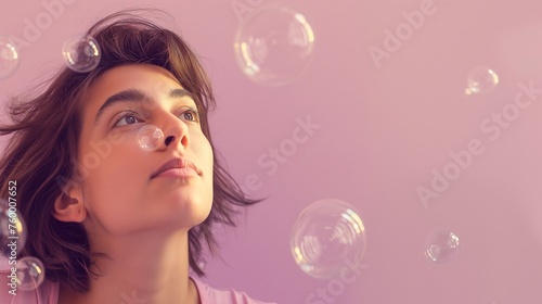 An image of a girl model in a whimsical pose, surrounded by floating bubbles against a solid lavender background.
