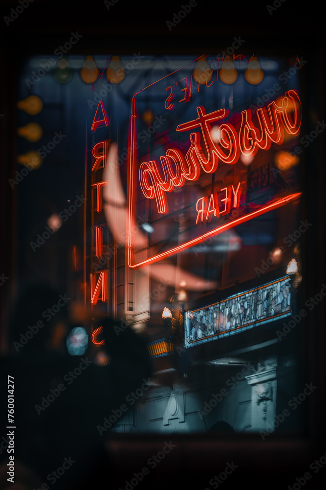 colorful neon in the night with silhouette of  person reflected  - obrazy, fototapety, plakaty 