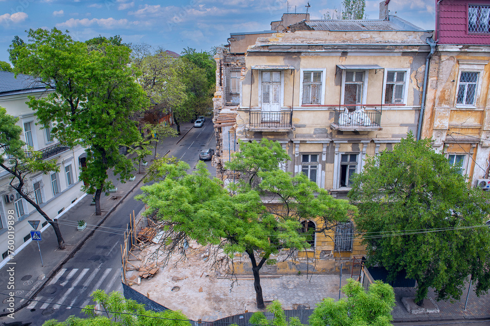 city center street with ancient buildings. destroyed building during reconstruction. Ukraine. Odessa.