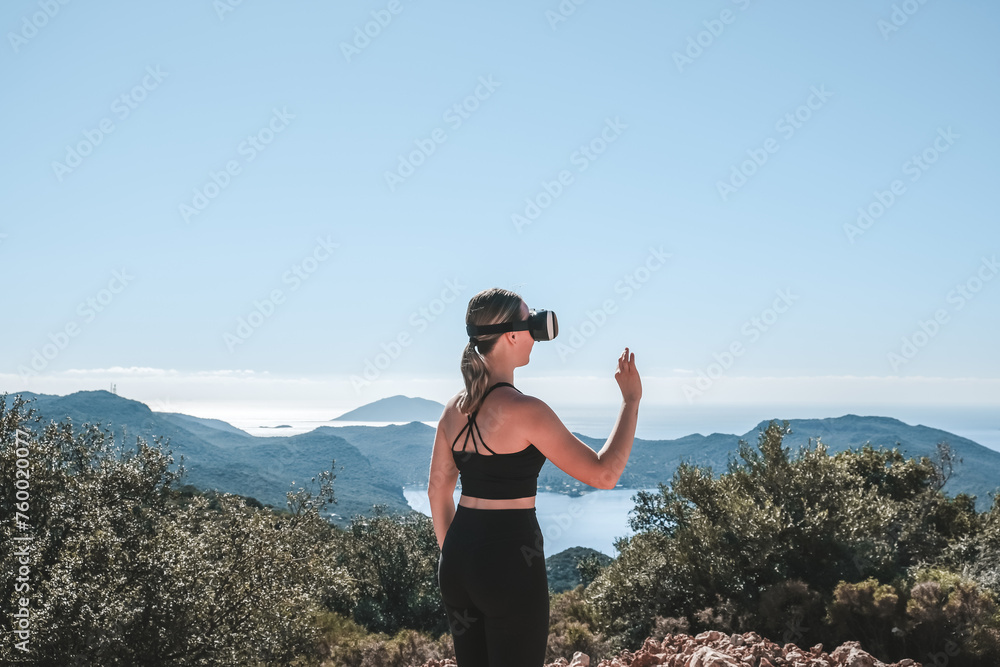 Traveler in virtual reality headset augmented with virtual reality in the concept of a beautiful mountain landscape, mountain trip, VR,reality, virtual, Traveler in virtual reality headset augmented with virtual reality in the concept of a beautiful mountain landscape, mountain trip, VR,reality, virtual,