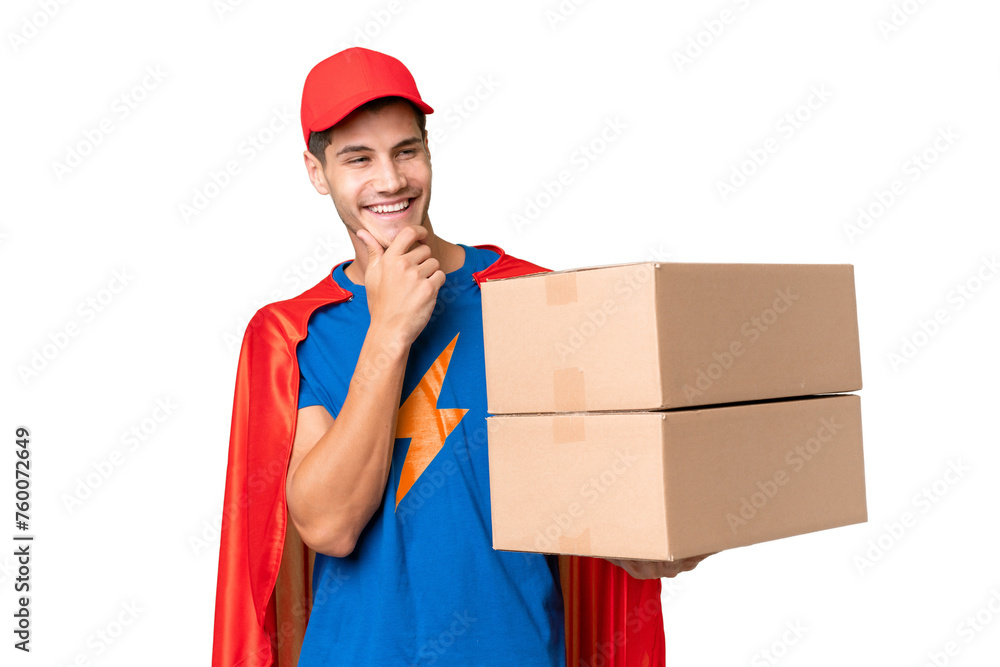 Super Hero delivery man over isolated background looking to the side and smiling Super Hero delivery man over isolated background looking to the side and smiling
