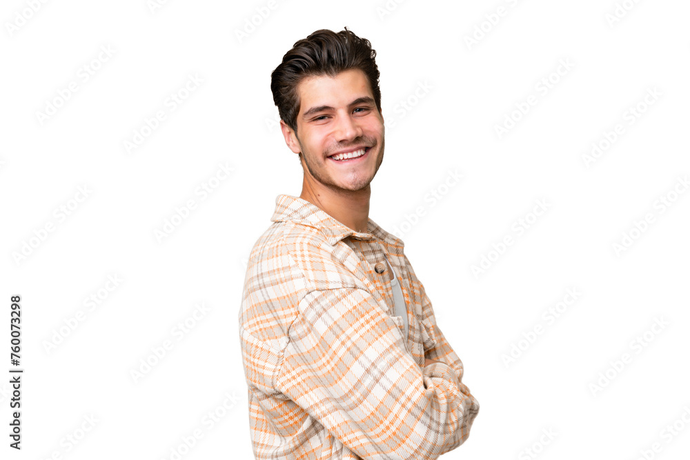 Young handsome caucasian man over isolated background with arms crossed and looking forward Young handsome caucasian man over isolated background with arms crossed and looking forward