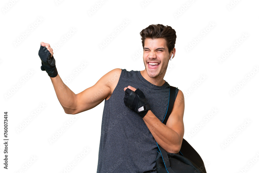Young sport caucasian man with sport bag over over isolated background making guitar gesture Young sport caucasian man with sport bag over over isolated background making guitar gesture