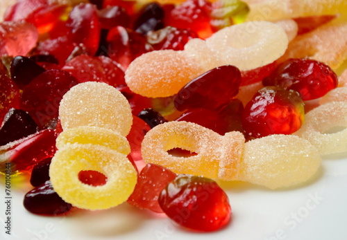 Lots of colorful candies made of jelly and various fruits, background and texture