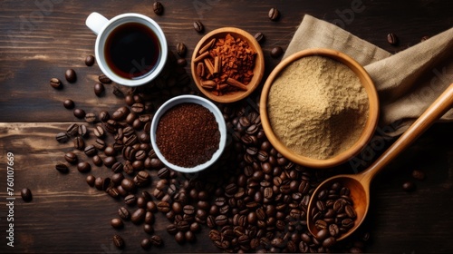 An assortmentively arranged display of coffee beans, grounds, and cinnamon sticks on a textured background