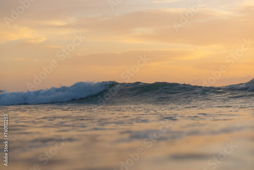 Ocean view with orange sunrise sky. © AlexandraDaryl