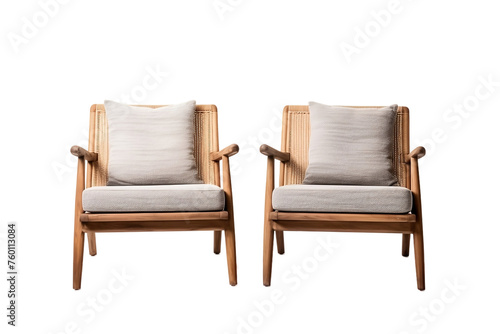 Sophisticated teak wood chairs complemented by woven rattan and cushioned foam.