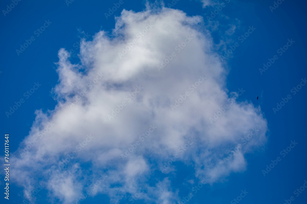 Obraz premium Traditional clouds on blue sky background