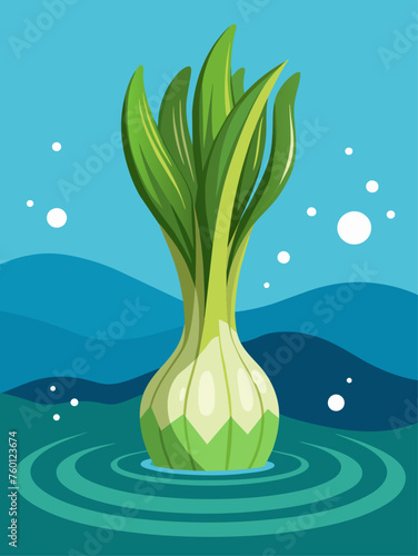 A leek vegetable is submerged in water, with a blurred background.