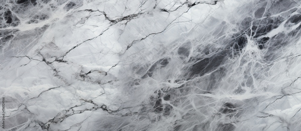 Closeup of a marble texture resembling a mixture of snowcovered rock and soil. The monochrome pattern is reminiscent of winter, with a freezing touch of natural material Closeup of a marble texture resembling a mixture of snowcovered rock and soil. The monochrome pattern is reminiscent of winter, with a freezing touch of natural material