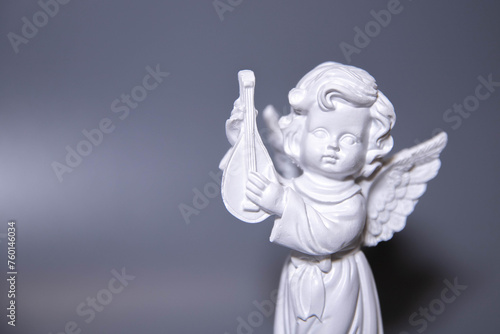 Marble statue of a beautiful angel isolated on white with clipping path