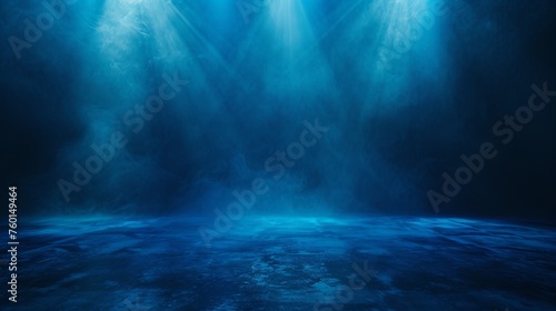 A captivating image expressing deep blue light rays penetrating through darkness, giving a mysterious vibe