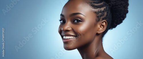 Bright Blue background Portrait of black african smiling beautiful woman with smooth clean face glowing skin youth skin care ad concept from Generative AI photo