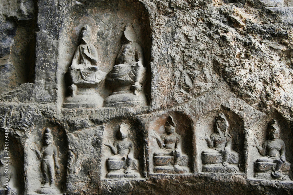 Longmen Grottoes are a series of rock shrines in which Buddhist subjects are portrayed, a UNESCO heritage site is one of the most famous sites in China (1)