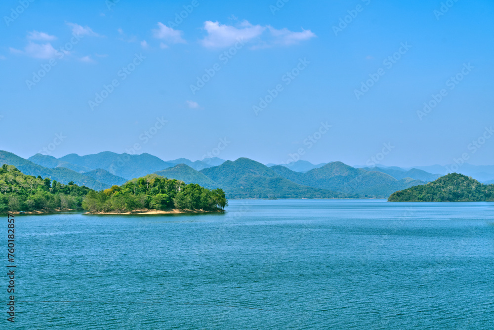 Beautiful scene in nature, landscape of mountains with waterfront and small islands, daylight image, space for copy.