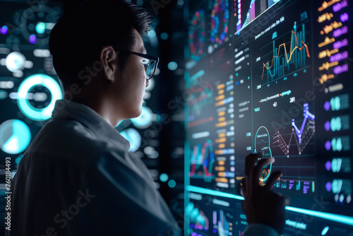 A businessman analyzing customer segmentation data on a virtual screen with dynamic visualizations.