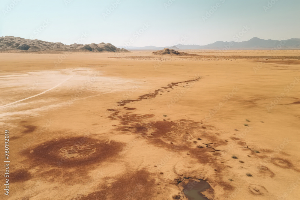 Arid Desert Aerial, Drone View of Dry Pond with Scant Water Arid Desert Aerial, Drone View of Dry Pond with Scant Water