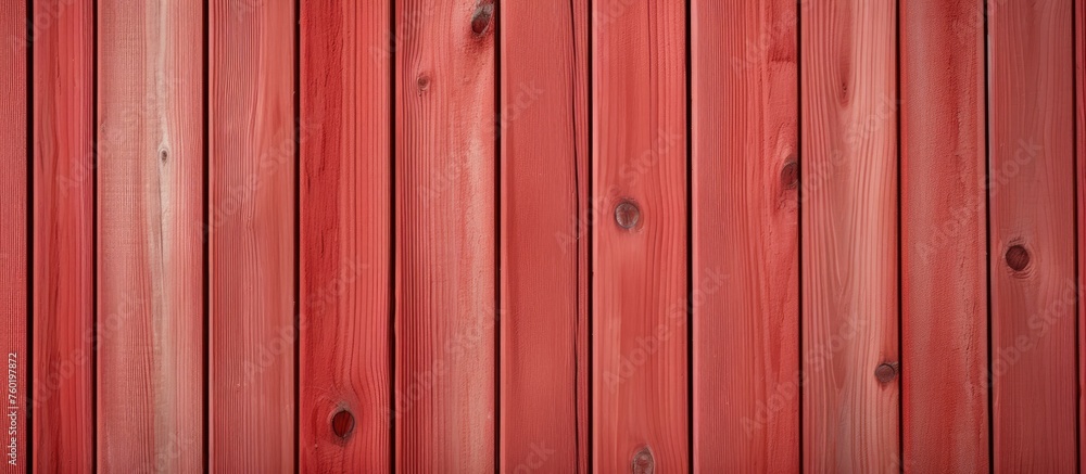 A closeup of a rectangleshaped red wooden fence, showcasing tints and shades of pink, magenta, peach, and carmine. The pattern created by the wood highlights its building material qualities A closeup of a rectangleshaped red wooden fence, showcasing tints and shades of pink, magenta, peach, and carmine. The pattern created by the wood highlights its building material qualities