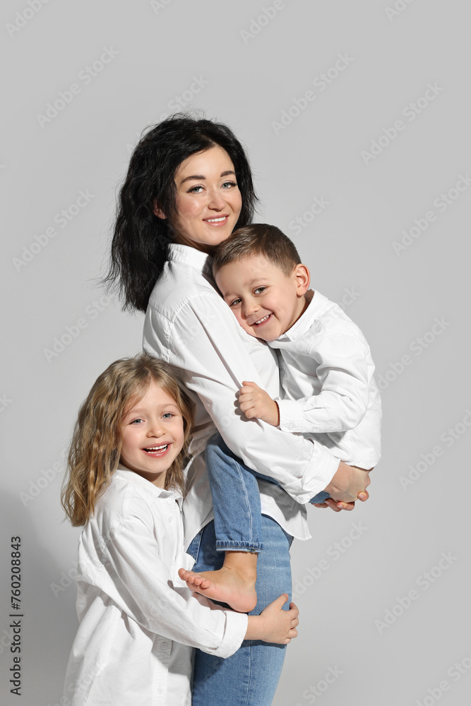 Little children with their mother on white background Little children with their mother on white background