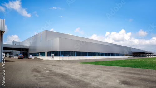 Expansive Industrial Warehouse on Cloudy Day
