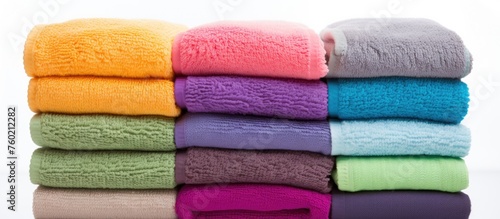 Luxurious Stack of Plush Towels Ready for a Relaxing Spa Experience