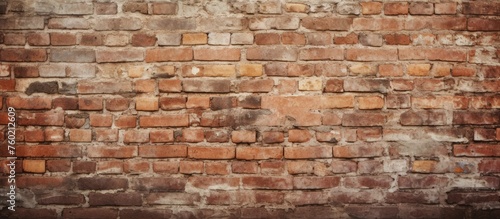 Revealing the Texture and Details of an Illuminated Brick Wall at Night