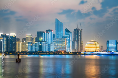 Modern City Skyline at Twilight Over Water