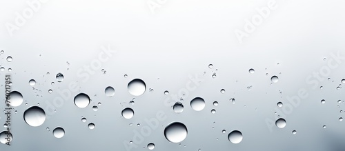 Captivating Water Droplets on Transparent Glass Surface in Close-up Macro Shot