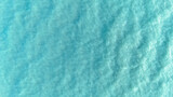 Sea aerial view. Top view of the sea water with the waves of the crashing onto the shore. background water sea natural view, for use as background for relaxation, travel. Mood freedom, feel fresh