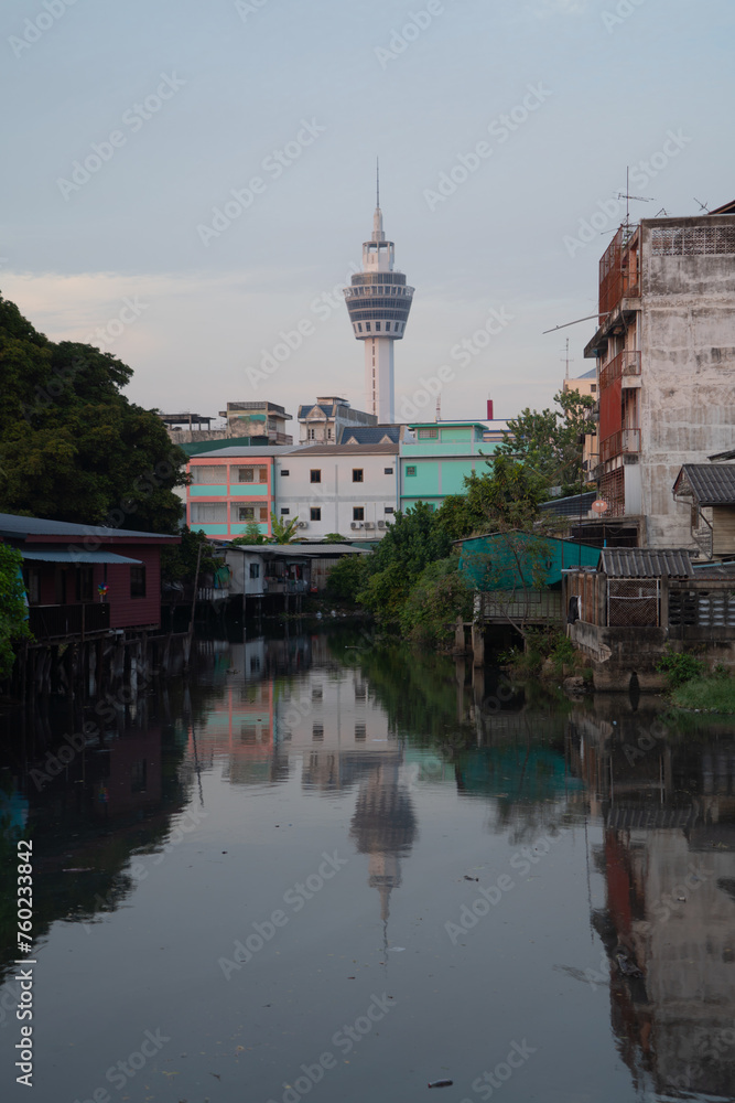 Samut Prakan Observation Tower with river reflection in urban city town, Thailand. Samut Prakan Observation Tower with river reflection in urban city town, Thailand.