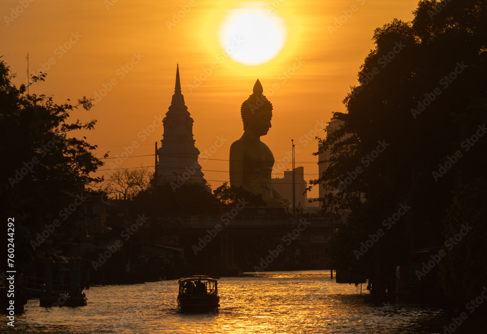 The Giant Golden Buddha in Wat Paknam Phasi Charoen Temple in Phasi Charoen district, Bangkok urban city, Thailand.