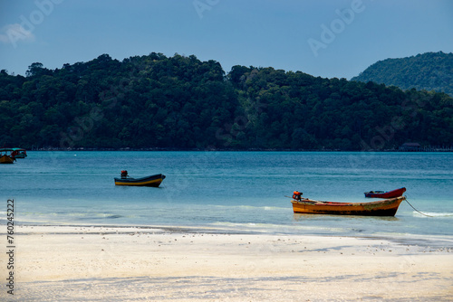 Boats on the shore of the sea on the beach of Koh Roag Sanloem in Cambodia 4
