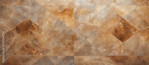 A closeup of a tile floor with a geometric pattern in brown, amber, wood, beige, peach, and fur colors. The flooring adds a stylish touch to the cuisine or any room