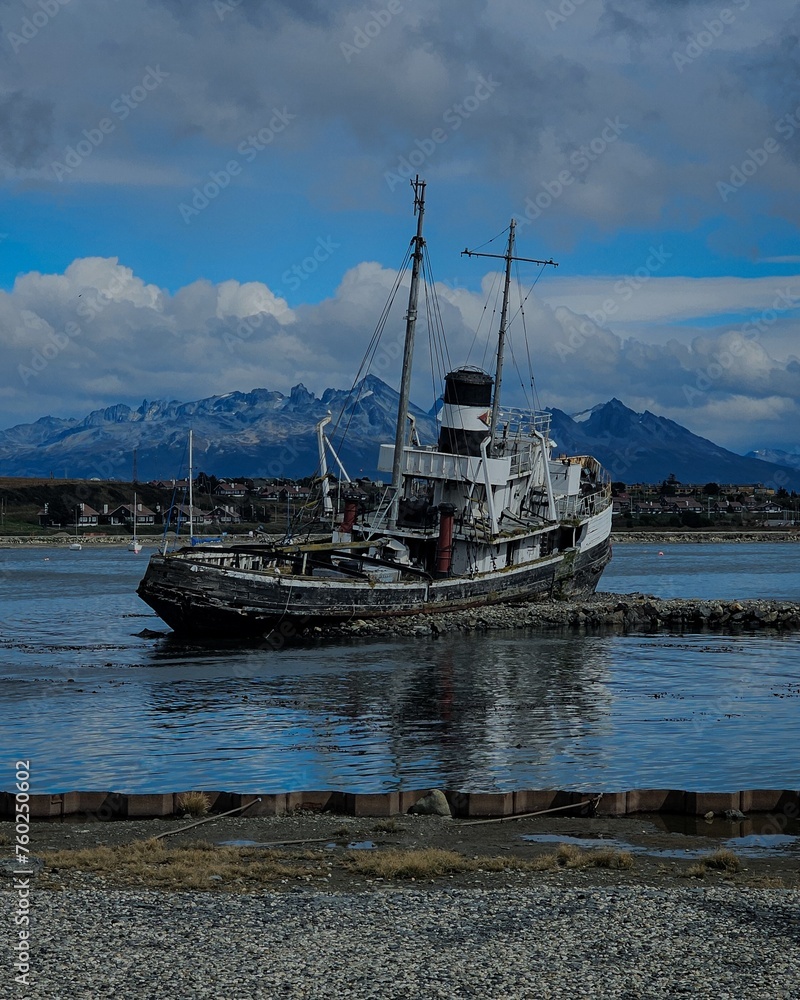 Old boat abandoned in the harbor of Ushuaia