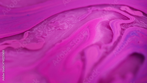 Ink water background. Pigment motion. Defocused color vivid pink purple liquid paint swirls flow spreading in wet substance hypnotic abstract art.