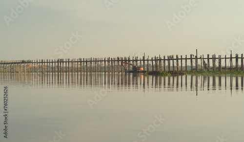 U Bein Bridge with lake, Wooden Bridge in Mon village, Myanmar or Burma, Asia.