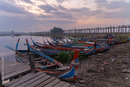 U Bein Bridge with lake, Wooden Bridge in Mon village, Myanmar or Burma, Asia. photo