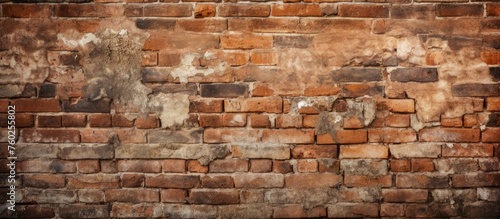 A detailed closeup of a weathered old brown brick wall with peeling paint, showcasing the intricate patterns and textures of the brickwork and composite materials