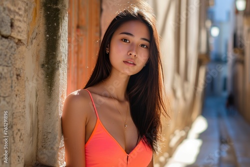 Asian girl in a bright-colored singlet adds vibrancy to the historic charm in a captivating portrait, Ai Generated.