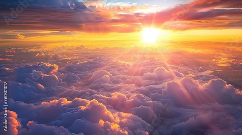 Beautiful sunset sky above the clouds with stunning light.